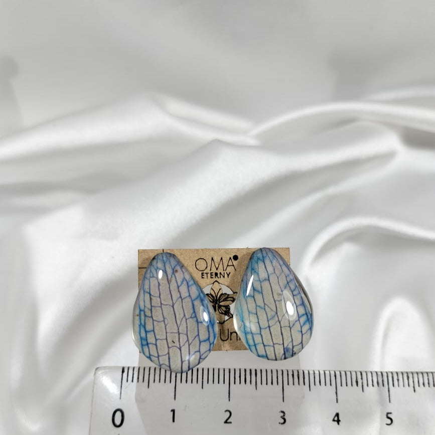 Aretes de pétalos de orquídea azules