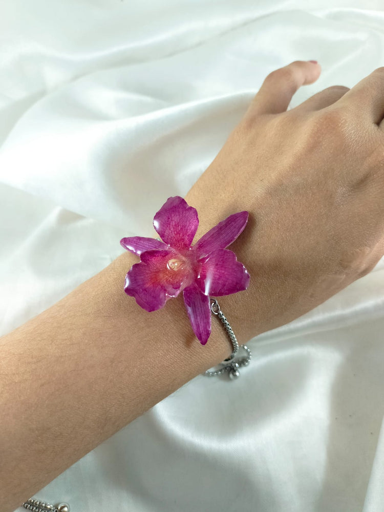 Pulsera de orquídea guinda