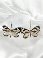 Aretes de mariposa de cristal