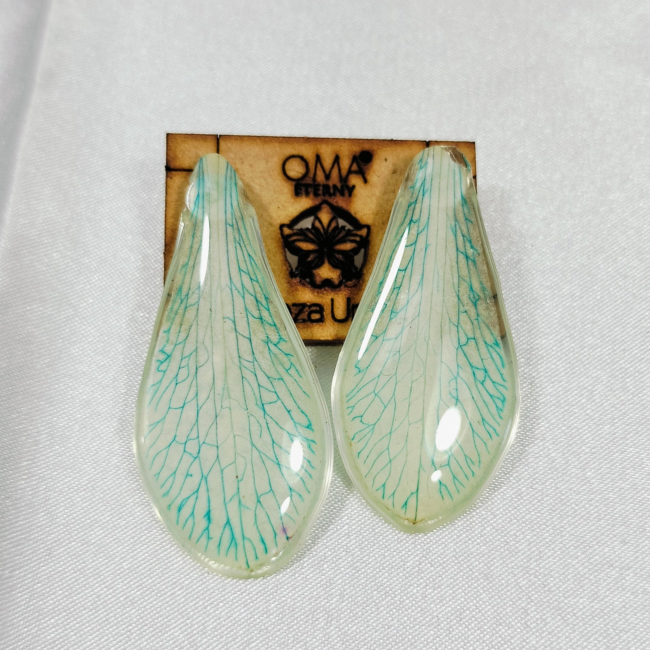 Aretes de orquídea tonalidad verde