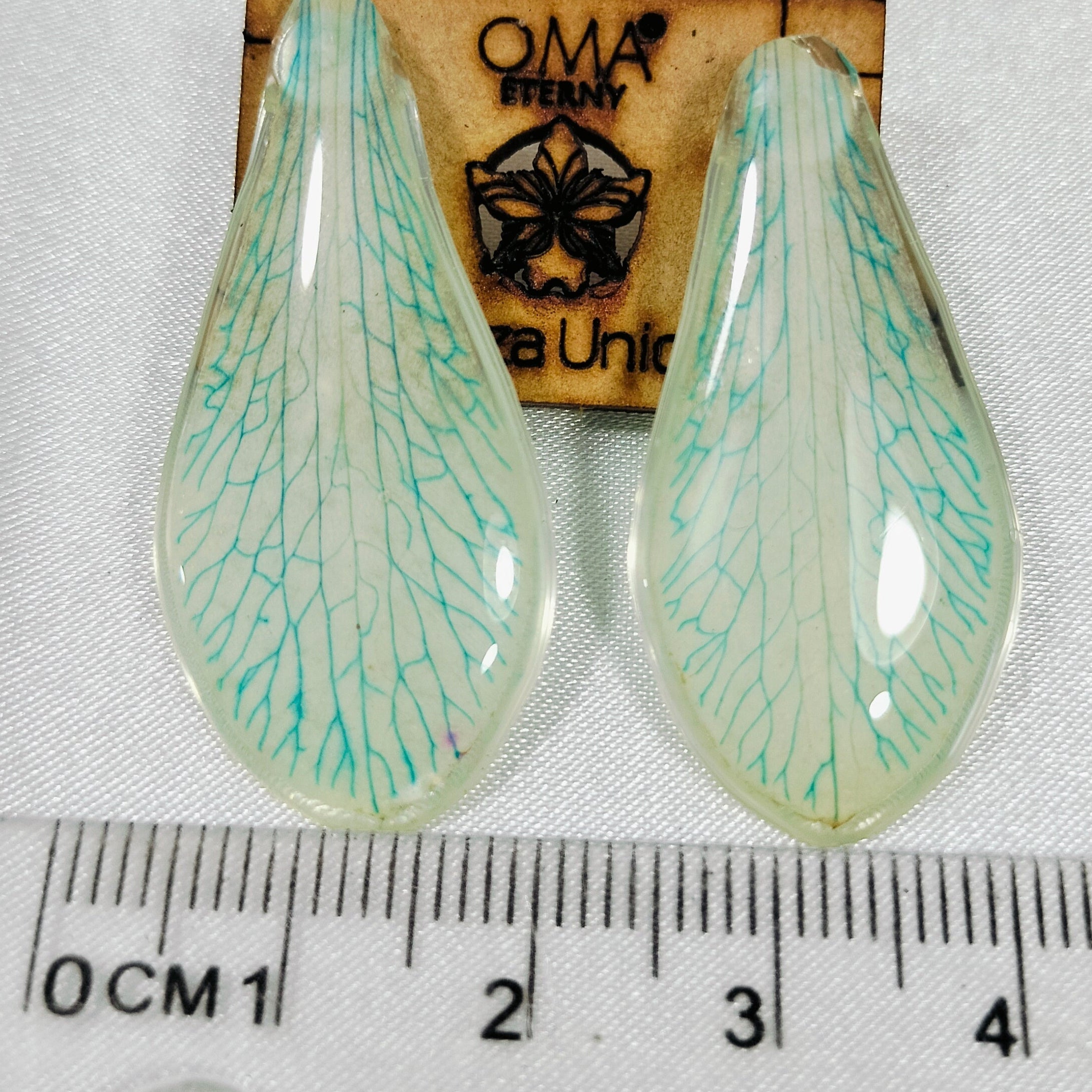 Aretes de orquídea tonalidad verde
