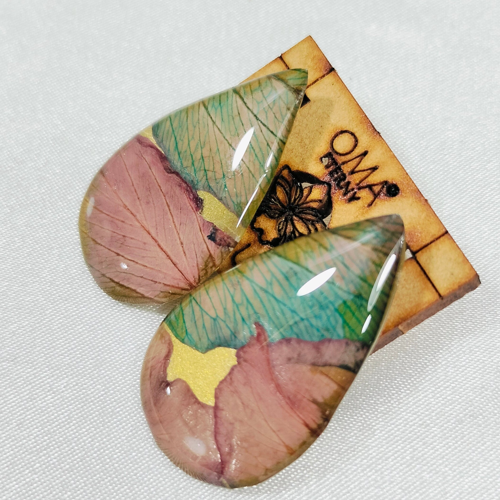 Aretes de orquídea en gota