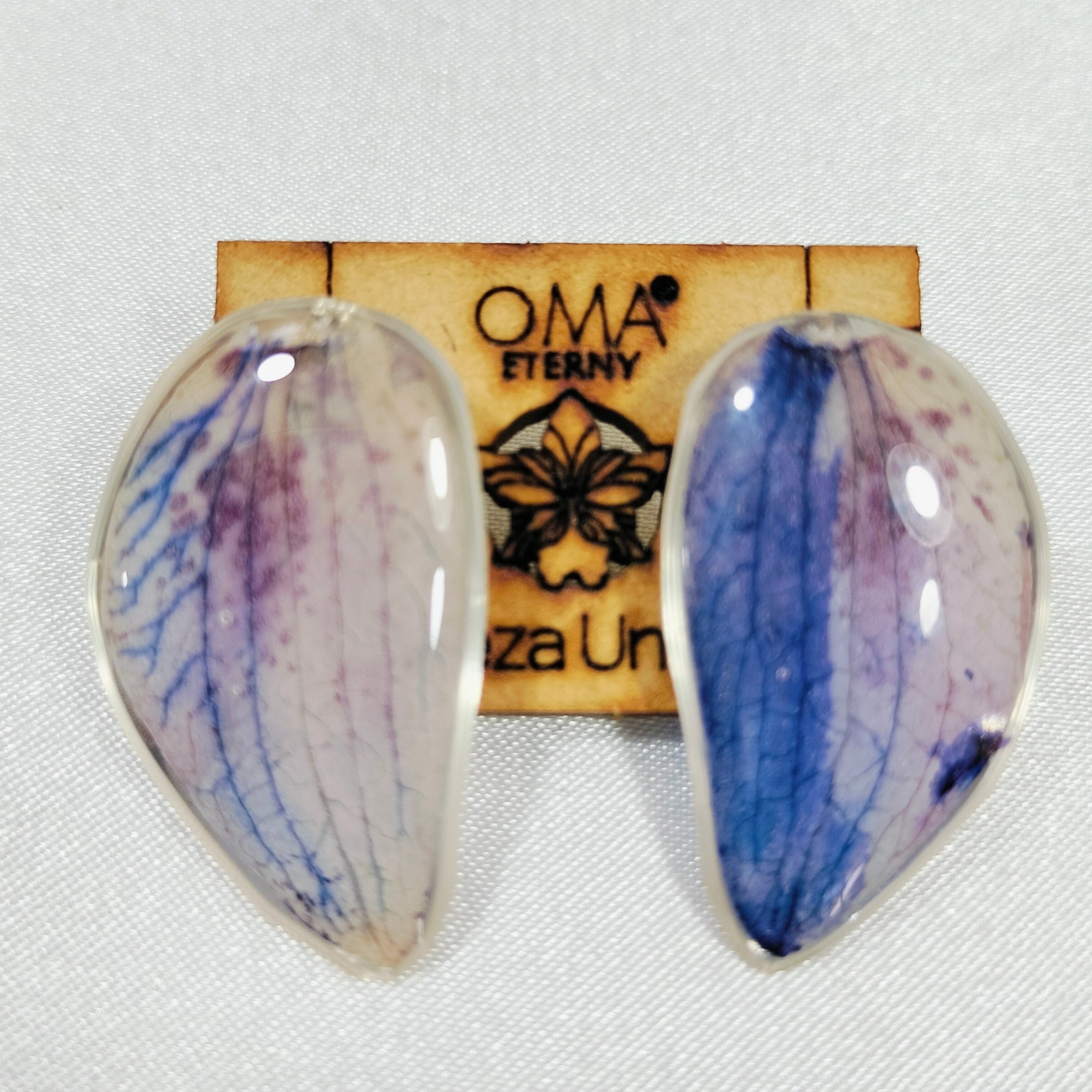 Aretes de orquídea en gota tonalidades azules