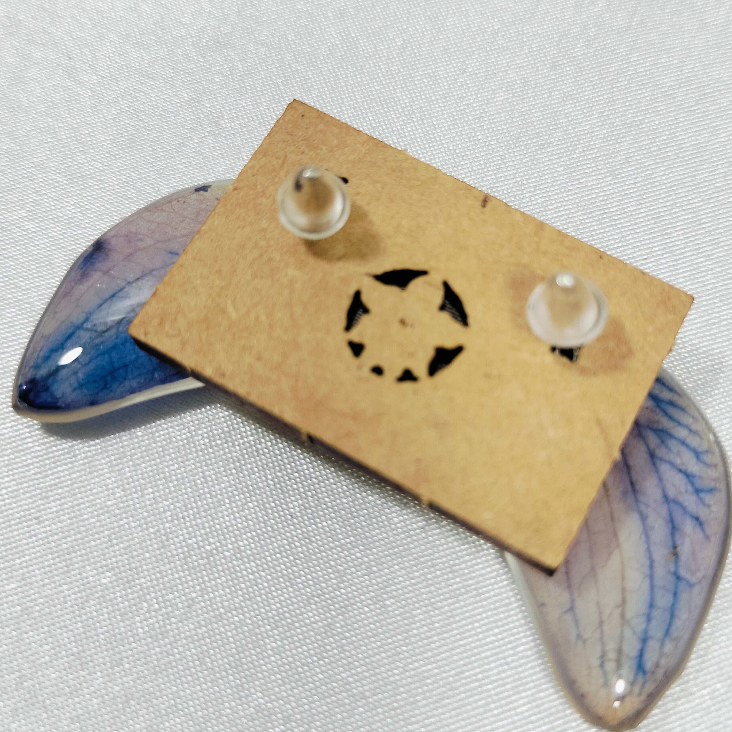 Aretes de orquídea en gota tonalidades azules