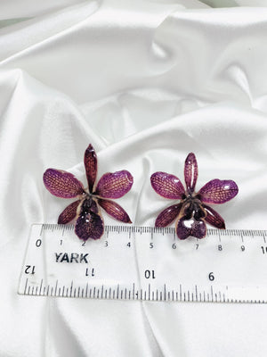 Aretes de orquídea morada