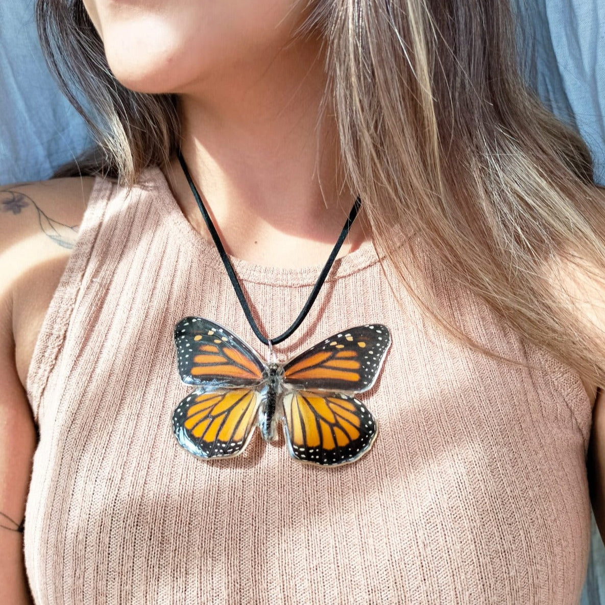 Dije de mariposa monarca