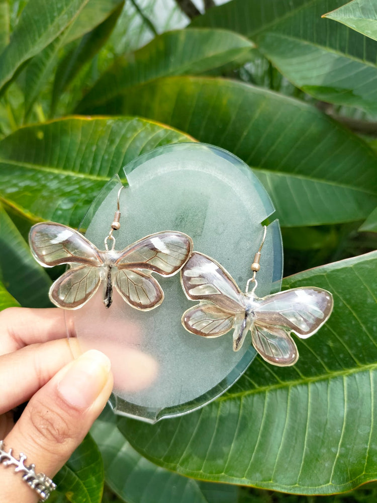 Aretes de mariposa de cristal