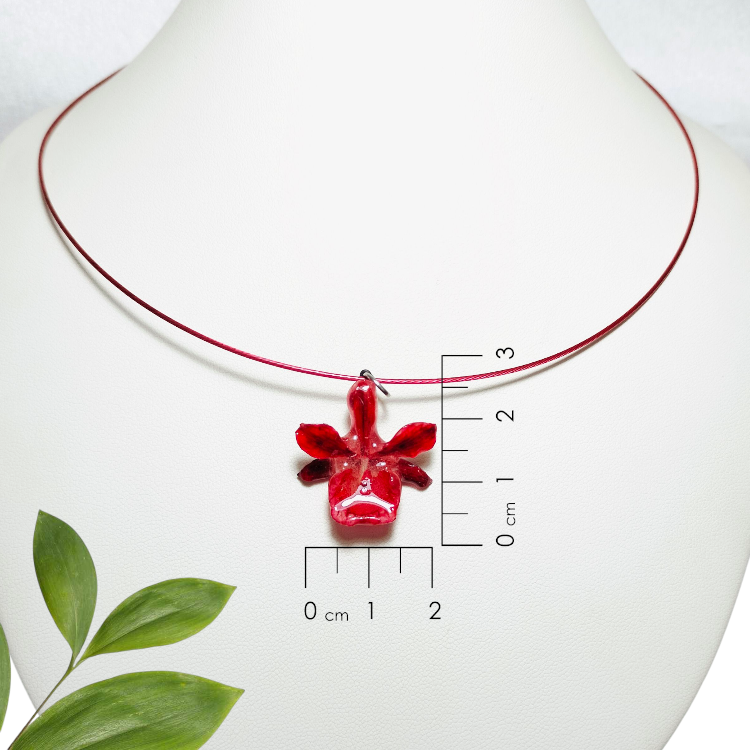 Dije de orquídea Roja