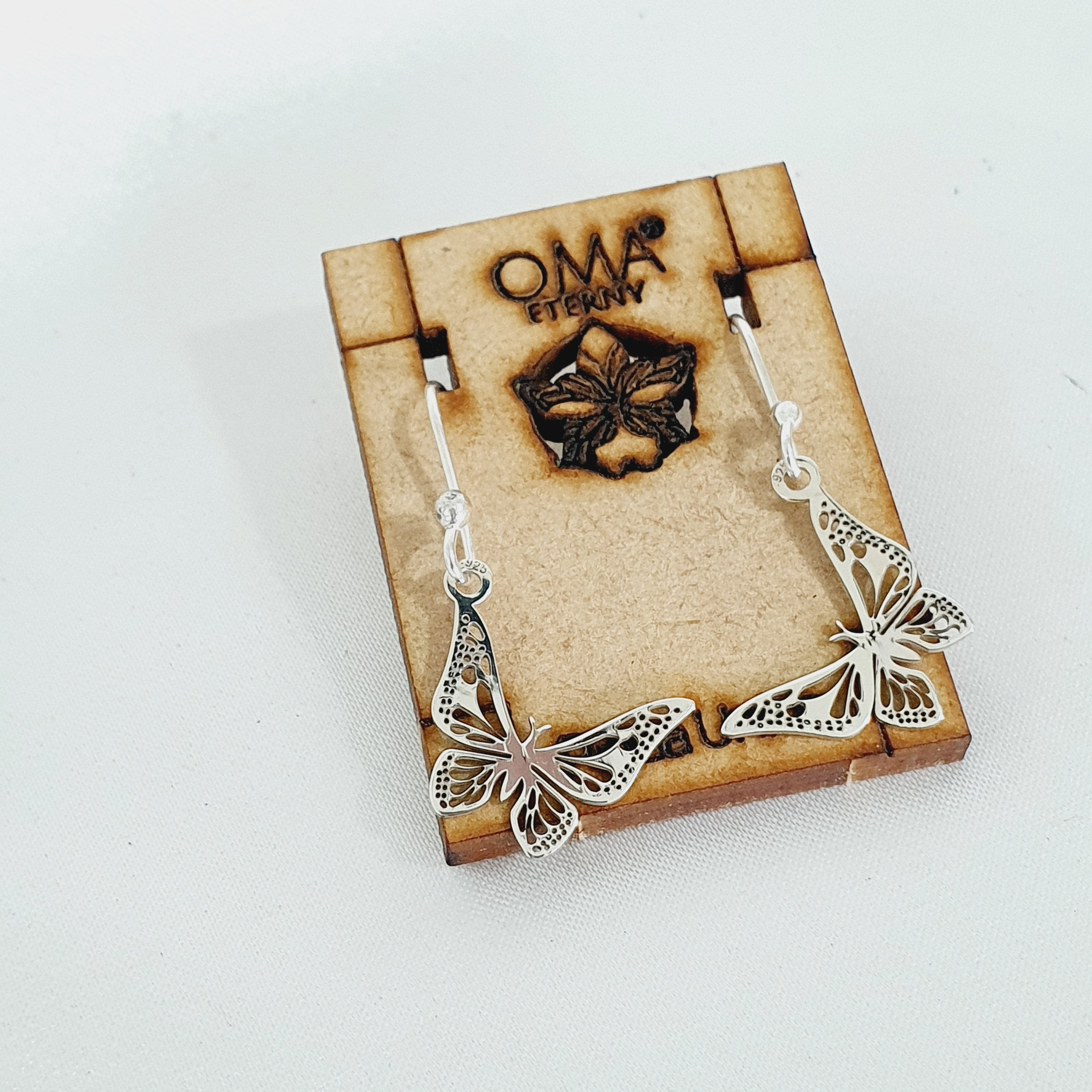 Aretes de plata con mariposa