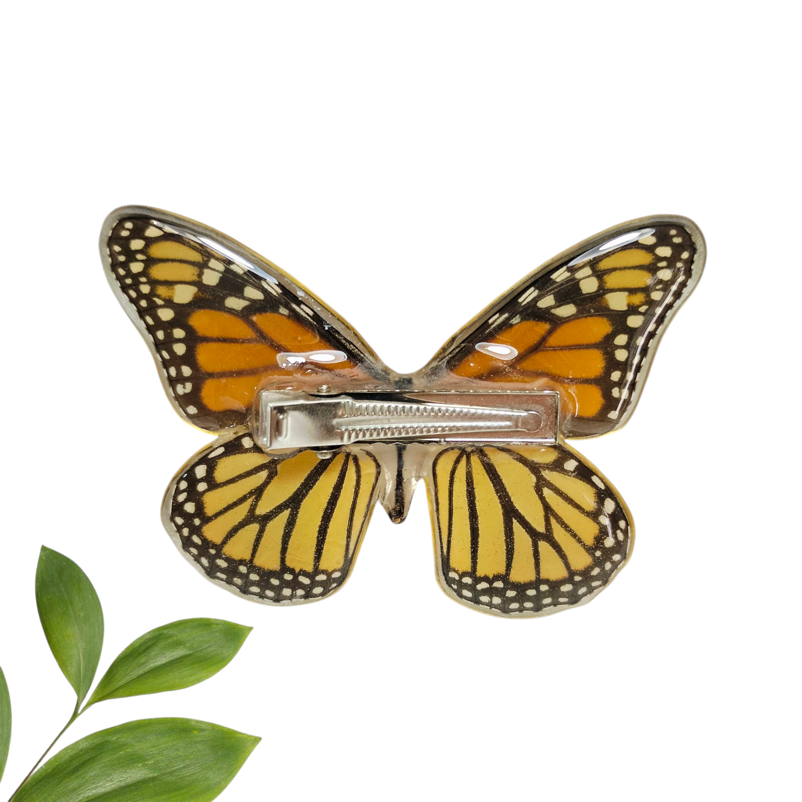 Dije de mariposa monarca con broche para cabello