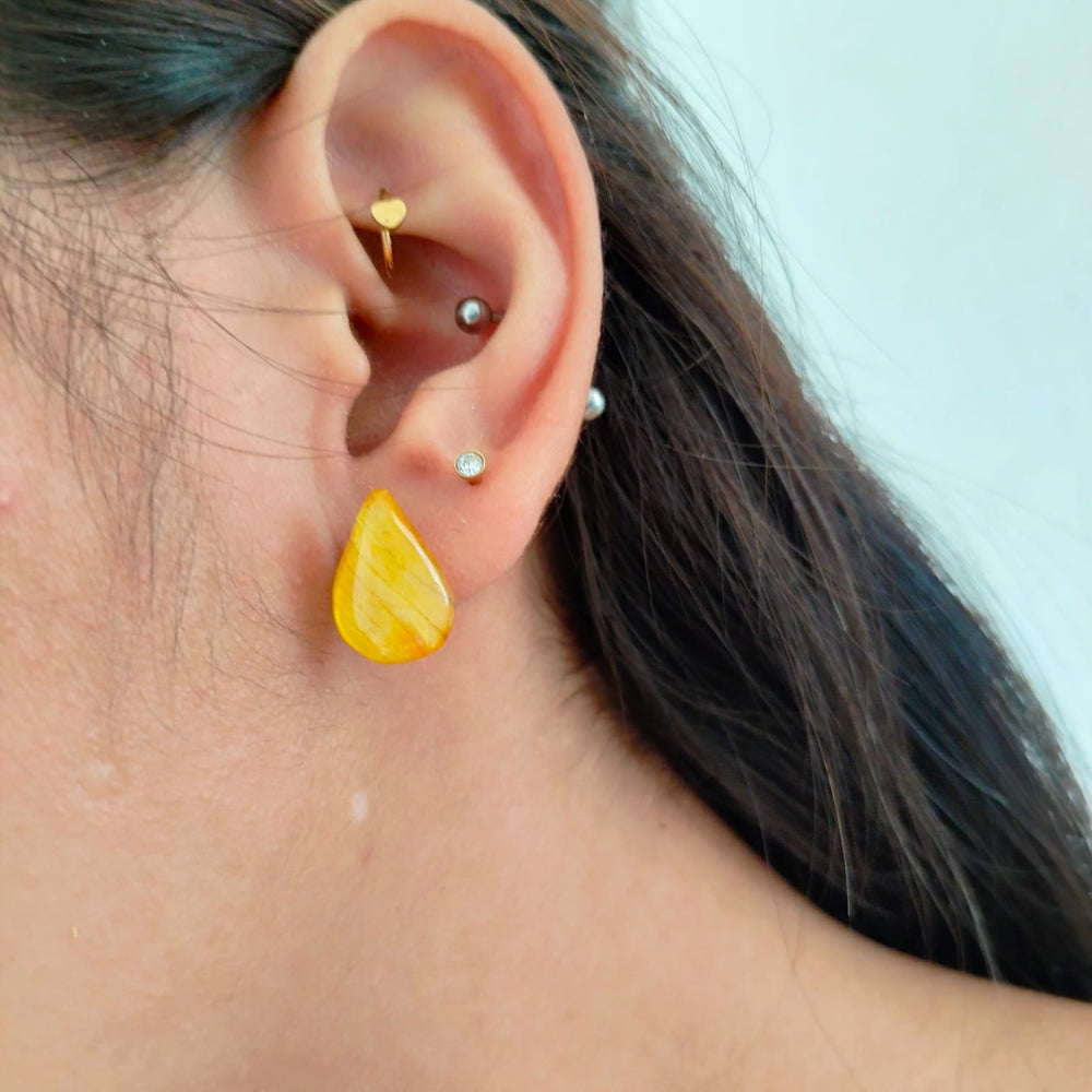 Aretes de pétalos de orquídea naranjas