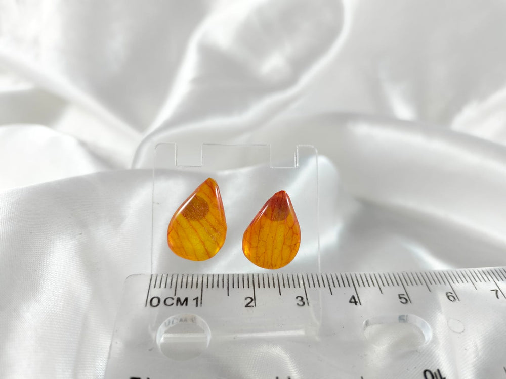 Aretes de pétalos de orquídea naranjas